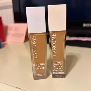 Two Lancome Paris foundation.